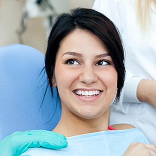 smiling woman at dentist